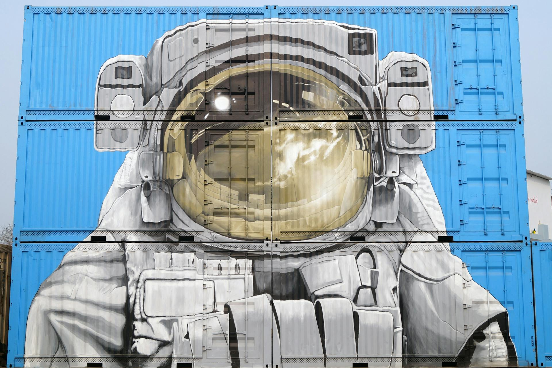 Astronaut mural on containers